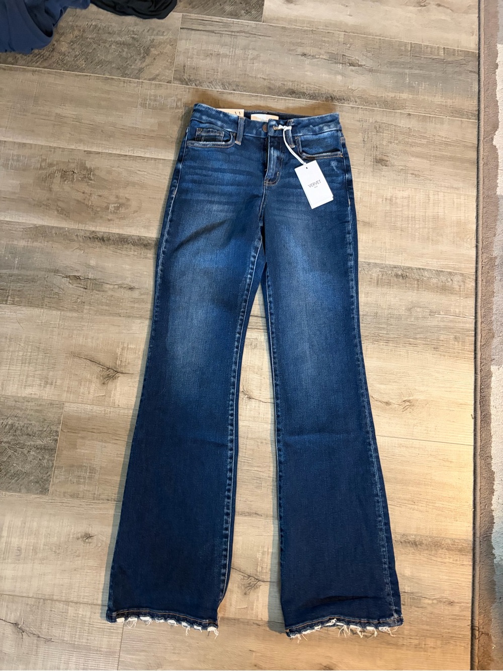 High-Rise Blue Bootcut Jeans with Frayed Hem
